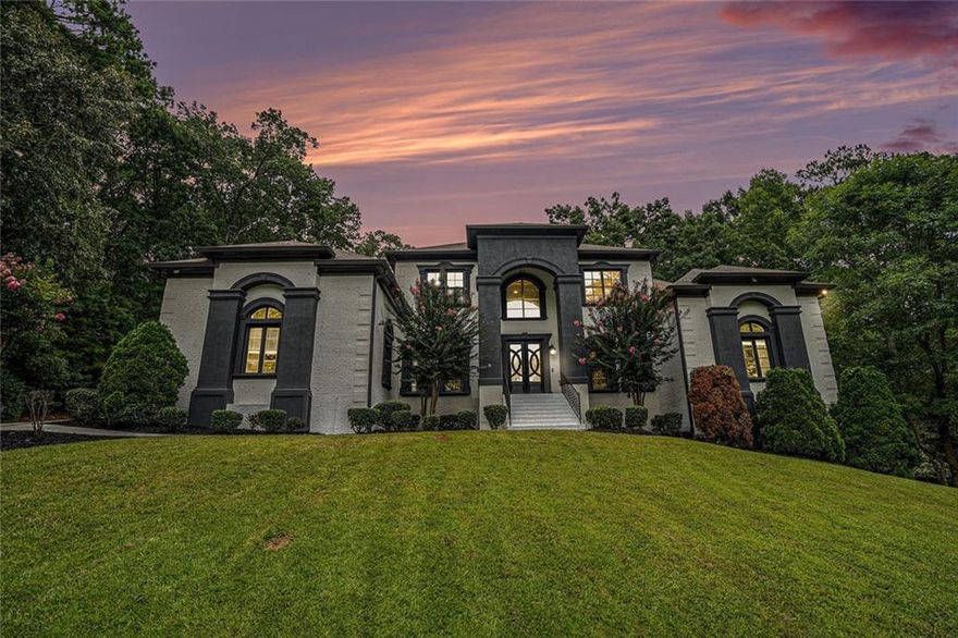 Imagine coming home to a private, gated sanctuary that feels a world away—yet keeps you connected to everything Atlanta offers. Welcome to 4025 Cascade Rd SW, a custom-built estate where 3 levels of refined living meets a lifestyle of elegance, comfort and effortless entertaining.

From the moment you step inside, THIS HOME MAKES A STATEMENT. Soaring floor-to-ceiling windows flood the main level with natural light, showcasing a dramatic open-concept design meant for both quiet mornings and unforgettable evenings. The great room, anchored by a commanding stone fireplace, flows seamlessly into formal dining and a chef-inspired kitchen, CREATING A SPACE WHERE CELEBRATIONS COME ALIVE AND EVERYDAY LIVING FEELS EXTRAORDINARY.

The Owner’s Wing on the main level offers more than a retreat—it’s A PRIVATE HAVEN WITH A COZY FIREPLACE, SPA-STYLE SHOWER, AND EXPANSIVE WALK-IN CLOSET. A secondary bedroom w/ensuite bathroom on the main level ensures guests or family enjoy privacy and comfort. Upstairs, 3 more spacious bedrooms and 2 full baths provide versatility, while THE TERRACE LEVEL TRANSFORMS THE HOME INTO AN ENTERTAINER’S DREAM—complete with a theatre room, family room with fireplace, open recreation area, bonus room with full bath, 6th bedroom and a stylish kitchenette with bar. Style it your way and finish out the spa room!

Indoor and outdoor living blend seamlessly. Step onto the expansive covered deck, accessible from the kitchen and Owner’s Suite, where you can sip morning coffee while listening to the breeze through the trees. Below, the covered terrace-level patio invites you TO HOST EVERYTHING FROM SUMMER COOKOUTS TO GAME-DAY WATCH PARTIES—all while overlooking your private, tree-lined 1.027-acre lot.

This estate’s lifestyle extends far beyond its walls. Just minutes away, explore the trails of Cascade Springs Nature Preserve, enjoy afternoons at West Cascade Park or Melvin Park, or take advantage of Atlanta’s thriving dining and cultural scene in nearby Downtown and Midtown. For jet-setting professionals, Hartsfield-Jackson International Airport is within easy reach, offering seamless travel access without compromising on privacy.

With 6 bedrooms, 5.5 bathrooms, 4 fireplaces and a 3-car garage, THIS RESIDENCE BALANCES SOPHISTICATION WITH WARMTH, MAKING IT EQUALLY SUITED FOR ELEGANT ENTERTAINING AND EVERYDAY LIVING.

4025 Cascade Rd SW isn’t just a home—it’s a story waiting to be lived.