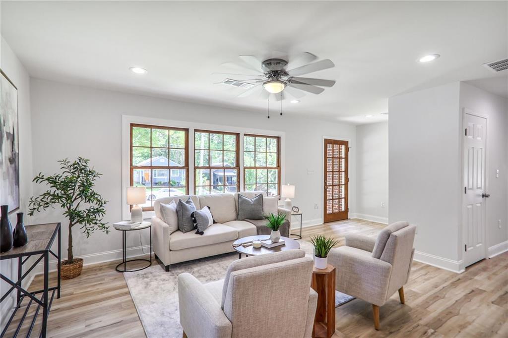 Check out this beautifully renovated home, minutes walk to the Beltline, restaurants, breweries and shops! This home is larger than it appears and has been completely updated. Open the front door to gleaming new floors and tons of natural light throughout with all new windows. This home features a spacious open floorplan connecting living, kitchen and dining rooms; perfect for entertaining friends and family. Whip up delicious meals in your chef-ready kitchen with tall white shaker cabinets, sparkling quartz countertops and new Stainless Steel Appliances. Relax in your private master with walk-in closet and refreshing ensuite bathroom. Enjoy the space of 2 additional guest bedrooms, guest bath and hallway laundry. This home is low maintenance with all new windows, roof, water heater, HVAC, plumbing, electrical, appliances, flooring, paint, fixtures and more! Spend evenings relaxing on the HUGE back deck, with kitchen and master bedroom entrances and overlooking your large backyard. Or walk to it all; The Beltline trails & parks and Lee + White Breweries, restaurants and shops. 10 minutes from downtown Atlanta, Mercedes Benz Stadium, Atlanta University Center, Tyler Perry Studios and Highways 75/85, 20 & 285. Don't miss out on the opportunity to make this renovated house your new home. Schedule a showing today and experience the best of Atlanta living!