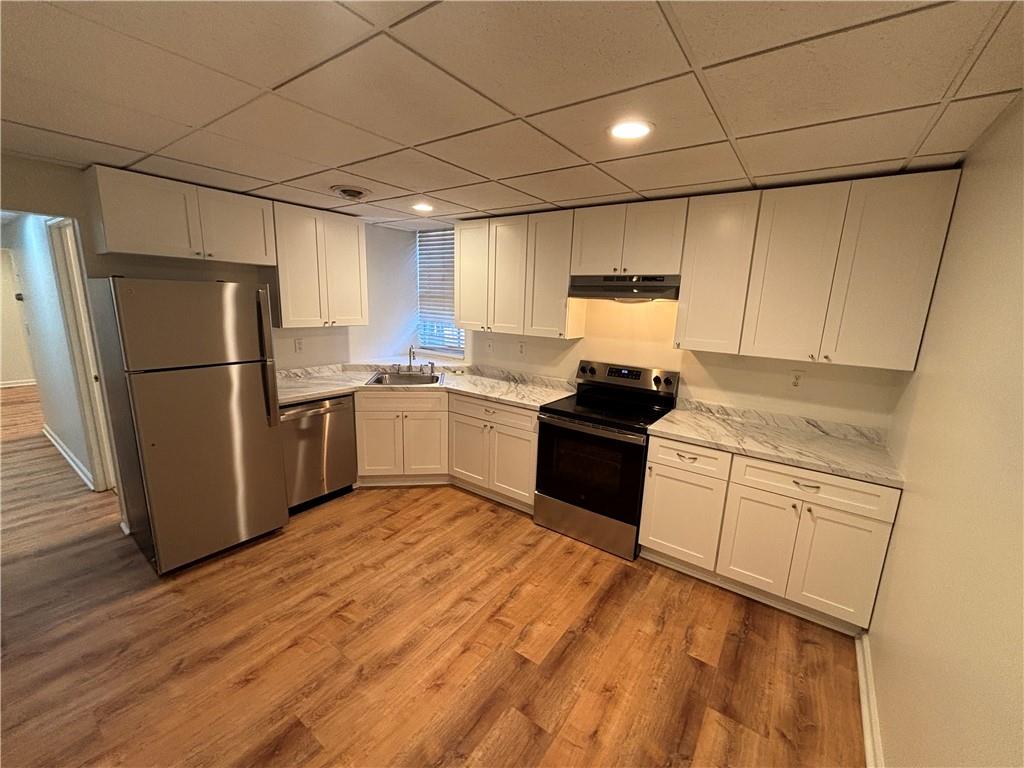 Fully renovated outstanding unit! This is a Triplex. This is a 1 bedroom, 1 bath basement apartment that is available. Pets are permissible on a case by case basis. The unit has it's own private entrance at the rear of the home. Unit is renovated top to bottom with new flooring and new kitchen! There is a backyard, and it is partially fenced. Minimum 1 year lease but long term leases are fine as well. This unit is available immediately. All appliances, including washer and dryer, are made available to the tenant. Tenant pays their share of utilities.