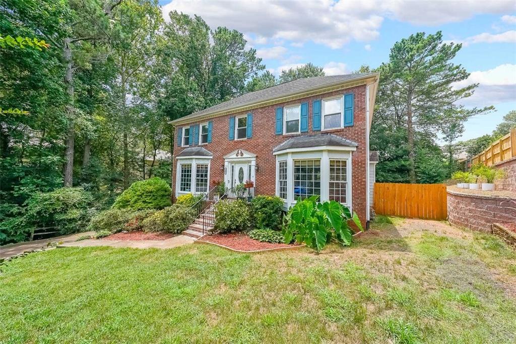 Located on a quiet cul-de-sac in the desirable Stockton's Chase, allow this home to warmly welcome you into its sunbathed two story foyer. Just
around the corner, you will find a European style kitchen, breakfast room, and separate dining room--a home chef's dream. Within view from the
kitchen, a spacious living room centers around a cozy brick fireplace, the perfect environment to make memories with loved ones. Just a few steps
away is an expansive deck, a serene spot for sipping your morning coffee, unwinding after a long day, or entertaining friends and family. The deck
overlooks a private, fenced backyard with plenty of space for a garden, fire pit, or play area. Stepping back inside, you will find a sizable office with
large windows offering an abundant amount of natural light-- an ideal space for remote work or focused study sessions. Explore the upstairs level to
discover four generously sized bedrooms, including a primary suite with a functional layout designed for comfort. The upstairs level also offers a newly renovated full bathroom with a sleek, modern design. Stepping into the lower level, you
will be pleasantly surprised with a partially finished basement. Whether it's gaming, music, fitness, or crafting that you enjoy, this is a space where
you can be free to play, imagine, build, and create. With highly rated schools, close proximity to popular shopping, restaurants, and entertainment,
wonderful neighbors ready to share good times by the pool or friendly competition on the tennis courts--don't miss this opportunity to love where
you live in Stockton's Chase.