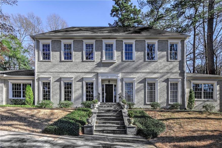 Located on a quiet street in the heart of Buckhead. This house has it all! Soaring ceilings up and down, light-filled floor-to-ceiling windows, spacious rooms, beautiful hardwood floors, master on main, three interior fireplaces, and a large kitchen opening to the family room. It also features an upstairs recreation room with a large outdoor balcony overlooking the flat backyard which has an outdoor fireplace, a spacious flagstone patio, and plenty of room for a tennis court or pool. A special home with all the spaces needed for everyday enjoyment. Come see!