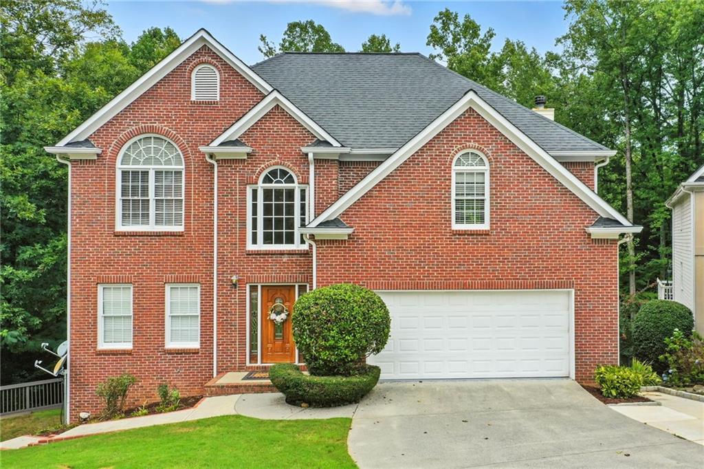 Welcome to this spacious 6-bedroom, 3.5-bath home nestled on 1.34 acres in the sought-after Woodridge neighborhood. This property offers the perfect blend of space, functionality, and charm, with a serene creek running along the backside of the yard and mature hardwoods throughout.
Step inside to find freshly painted interiors and cabinetry, creating a light and inviting atmosphere. The main level boasts granite countertops throughout, a formal dining room, a den, and a living room—giving you plenty of space to gather and entertain. Ample storage and a freshly painted garage add to the home’s convenience.
The heart of the home is the kitchen, beautifully accented by updated finishes and plenty of prep space. Upstairs, you’ll find generously sized bedrooms, including a comfortable owner’s suite with room to relax.
The finished basement offers the perfect in-law suite or separate living quarters, featuring its own kitchen, living room, 2 bedrooms, and a bath. Whether used for guests, extended family, or rental potential, this area adds incredible versatility.
Outside, enjoy the peaceful setting of over an acre, complete with an extra parking pad, a 2-car garage, and a private backyard retreat bordered by a creek. This home combines modern updates with thoughtful design in a beautiful natural setting—ready for its next owner to enjoy.