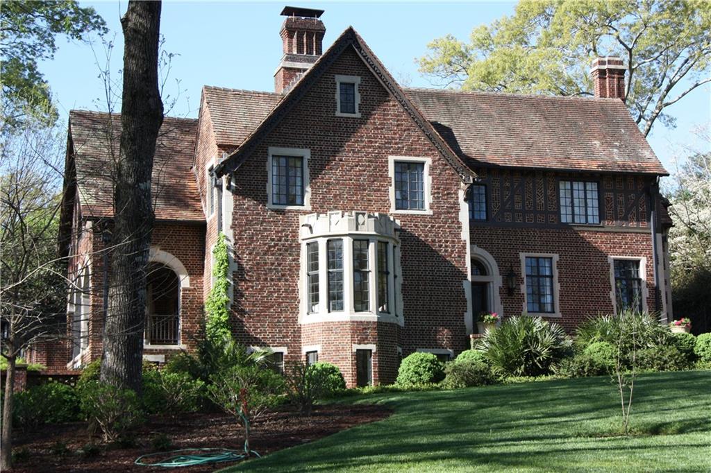 LIVE BRILLIANTLY! Renovation and expansion of a classic Druid Hills estate property by HammerSmith. Featured in Elle Decor and Atlanta Homes and Lifestyles. This is absolutely the best home available in the Intown Market. Main house includes 4 or 5 bedroom suites and full finished basement. Wine cellar with groin vaulted ceiling, elaborate tasting room. Oversized garage with workshop, 1 bedroom carriage house and acres of grounds. Extraordinary finishes and cutting edge decor. 6th bed and 6th bath up are in guest house.