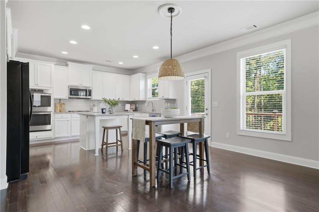 The heart of the home?bright, open, and designed for gathering, entertaining, and everyday living.