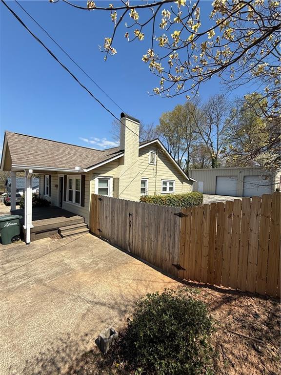 Renovated property has 2 building on one lot. Front building used as a professional office. Free standing industrial warehouse in the back at 1,300 sq ft & 15' ceiling height. Fenced and gated. Parking lot for multiple vehicles.