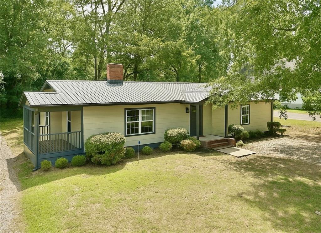 Remodeled & Ready in the Heart of Social Circle. Fall in love with this beautifully updated home just minutes from downtown Social Circle! Featuring a full remodel with stylish recessed lighting, an upgraded kitchen, modernized bathrooms, and a cozy fireplace, this home blends classic charm with today's comfort. Inside, you'll find a bright and open floor plan perfect for everyday living and entertaining. The kitchen offers updated appliances and dining space, while the spacious bedrooms provide room to relax and recharge. Close to shops, dining, and schools with quick access to I-20 this home is move-in ready and waiting for you! Don't miss your chance to own a piece of Social Circle charm. Schedule your showing today!