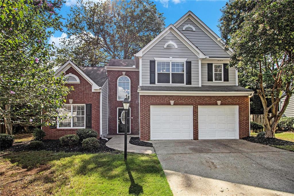 Enjoy outdoor entertaining on the expansive deck overlooking a private, wooded backyard—perfect for relaxing or hosting guests! Nestled on a beautifully manicured, level cul-de-sac lot, this home is located in a vibrant swim/tennis community in a sought-after East Cobb location.
Inside, you'll find a bright and open floor plan featuring vaulted ceilings, gleaming hardwood floors, a central vacuum system, and both a separate living room and fireside family room. The eat-in kitchen shines with crisp white cabinetry and granite countertops, flowing seamlessly into the cozy family room.
Upstairs, the spacious primary suite offers a tray ceiling, walk-in closet, and a spa-like en-suite bath with dual vanities, a garden tub, and a separate shower. Two additional bedrooms and a full bath complete the upper level.
This move-in ready gem offers comfort, style, and a prime location—don’t miss your chance to make it yours!