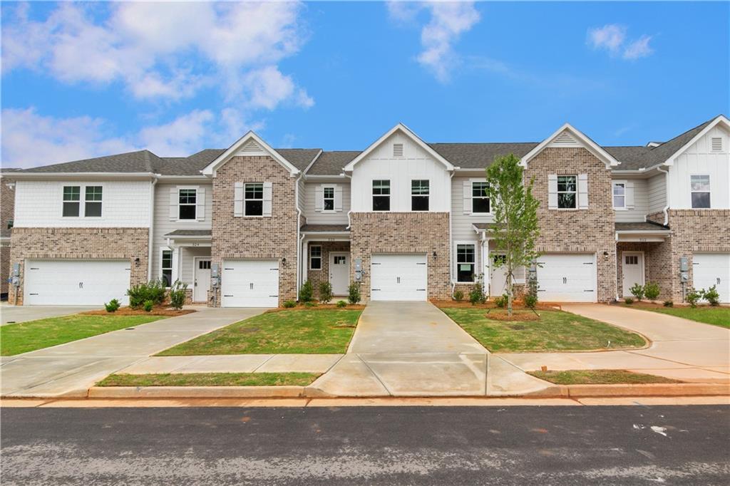 Welcome to Avery Landing by DRB Homes – your new home in the highly sought-after McDonough area!
This beautifully crafted single-family townhome combines style and functionality, with no detail overlooked. The spacious Braden floor plan offers 3 bedrooms, 2.5 bathrooms, and an open-concept main level perfect for modern living and entertaining.
The gourmet kitchen is a true showstopper, featuring a large island with quartz countertops, stylish painted cabinetry, and a generous pantry for storage. Upstairs, the inviting owner’s suite includes a sizable walk-in closet, dual vanities, and a sleek tile shower.
Enjoy the convenience of included stainless steel appliances—side-by-side refrigerator, range, microwave, dishwasher—plus a washer and dryer. Additional highlights include a one-car garage with opener and a private patio—ideal for outdoor relaxation.
Avery Landing offers the perfect blend of comfort, design, and convenience. Schedule your tour today!
Please note: If the buyer is represented by a broker/agent, DRB REQUIRES the buyer’s broker/agent to be present during the initial meeting with DRB’s sales personnel to ensure proper representation. If buyer’s broker/agent is not present at initial meeting DRB Group Georgia reserves the right to reduce or remove broker/agent compensation.