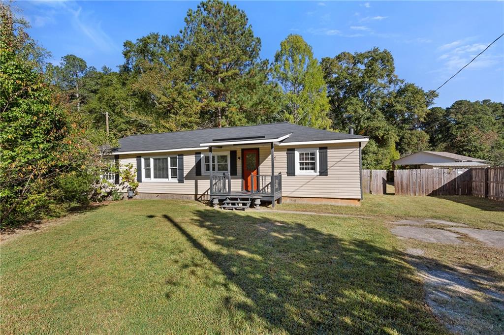 Welcome home to this updated and move-in ready 3-bedroom, 1-bath ranch nestled on a half-acre fenced lot—just minutes from both Downtown Marietta and Smyrna!
Step inside to find a bright, open-concept layout with laminate flooring throughout and large windows that fill the home with natural light. The kitchen features painted cabinets and plenty of counter space for meal prep and entertaining.
The spacious living area flows effortlessly to the covered back deck, the perfect spot for morning coffee or weekend gatherings. The expansive, flat backyard offers endless possibilities—garden, play area, or even an outdoor fire pit lounge.
Recent upgrades provide peace of mind, including:
- New septic tank & field lines
- New water heater
- New windows
- Newer HVAC system
There’s even a converted backyard shed with bar setup, ideal for entertaining or transforming into a creative studio or workspace.
Enjoy the convenience of nearby parks, shopping, dining, and easy access to I-75. Whether you’re a first-time buyer, investor, or downsizer, this charming ranch offers comfort, value, and room to grow.
? Don’t miss your chance to make 2730 Hembree Rd your new address! Schedule your tour today.