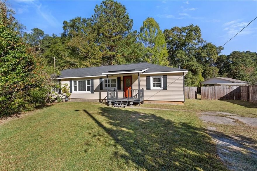 Welcome home to this updated and move-in ready 3-bedroom, 1-bath ranch nestled on a half-acre fenced lot—just minutes from both Downtown Marietta and Smyrna!

Step inside to find a bright, open-concept layout with laminate flooring throughout and large windows that fill the home with natural light. The kitchen features painted cabinets and plenty of counter space for meal prep and entertaining.

The spacious living area flows effortlessly to the covered back deck, the perfect spot for morning coffee or weekend gatherings. The expansive, flat backyard offers endless possibilities—garden, play area, or even an outdoor fire pit lounge.

Recent upgrades provide peace of mind, including:
- New septic tank & field lines
- New water heater
- New windows
- Newer HVAC system

There’s even a converted backyard shed with bar setup, ideal for entertaining or transforming into a creative studio or workspace.

Enjoy the convenience of nearby parks, shopping, dining, and easy access to I-75. Whether you’re a first-time buyer, investor, or downsizer, this charming ranch offers comfort, value, and room to grow.

? Don’t miss your chance to make 2730 Hembree Rd your new address! Schedule your tour today.