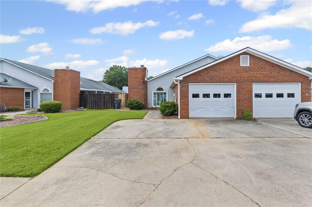 Move-in Ready 2 bedroom, 2 full bathroom townhome in award-winning Fayette County School District! This property has it all at an unbelievable price! Single-level living with an attached 1-car garage and a private fenced-in side yard with patio. Entire place is newly painted with brand new carpet in the bedroom. There is a large laundry room with an additional storage room connected. View our 3D walkthrough for all the details. Location can't be beat right near downtown Fayetteville! Schedule your private tour today!
