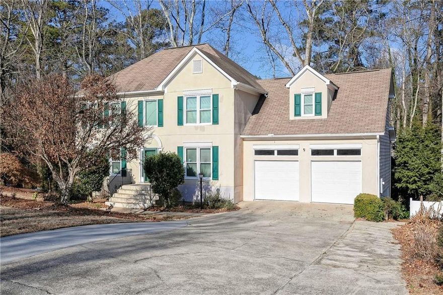 Located just off a quiet cul-de-sac, this house features 7 Bedrooms, a basement in-law suite and one of the largest floorplans in this active swim / tennis community!  The main level has a bedroom, full bath, fireplace, kitchen, separate dining room, laundry room and a deck overlooking a bubbling brook.  A 240v outlet is conveniently located in the garage to charge up your car.  Upstairs are 4 large bedrooms and 2 full bathrooms with walk-in showers.  The basement level suite has a 2nd kitchen, a full bathroom, laundry, 2 bedrooms and a bonus room. This swim/tennis community has sidewalks along the main roads and is only minutes from the Silver Comet Trail.

Centrally located: 10 minutes to Kroger, Publix, Target, Walmart, the Silver Comet Trail, multiple Cobb County parks, Wellstar Hospital, Home Depot, Lowes, Chipotle, Starbucks and more!