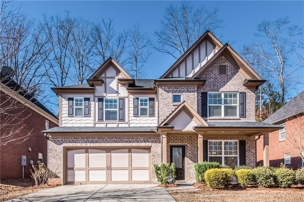 Wonderful 5-bedroom 4-bathroom home in popular Mabry Park, Hardwood floors on main level; inviting 2 story foyer with separate dining room, fireside family room; Gourmet kitchen features an abundance of wood cabinets, stainless steel appliances- refrigerator, microwave, gas stove and dishwasher with an eat in breakfast area; 5th bedroom and 4th bathroom on the main level; glamorous owner's retreat is upstairs with a large bedroom and sitting room, trey ceilings, tiled bathroom has garden tub, separate shower, dual vanities, huge walk-in closet; 3 additional bedrooms, 1 with private tiled bathroom and other 2 share the Jack/Jill style tiled bathroom; Open loft area and walk-in laundry room; Very private level back yard is fenced, covered patio. Almost in the cul-de-sac. Close to shopping, Ga400, YMCA, Big Creek Greenway, Emory Hospital. Top schools
