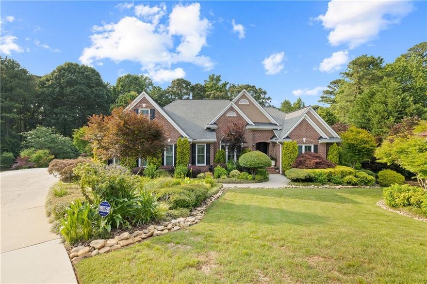 Once-in-a-lifetime opportunity: this Montclair [Brookwood HS] stunner - priced below appraised value - offers the most breathtaking, no-expense-spared backyard you will EVER come across, PLUS a CINEMA with kitchenette, HOBBY ROOM, gorgeous SPA-like renovated baths and cedar closets throughout. Note the 2700 sq ft fully FINISHED BASEMENT with a MOTHER-IN-LAW SUITE (bed/bath) & 2nd laundry, 2nd kitchen (!), as well as a living room, GAME ROOM, 2-room home GYM, half bath, and WORKSHOP. Entertain in the BACKYARD OASIS or simply enjoy it yourself: hardscaping trails and steppingstones wound through pergolas and trellises, a built-in grilling station with picnic table, meditation benches among Japanese maples, a sunning patio under palm trees, a firepit settled in slate chips, trex decking with solar lighting, koi pond, luxury side yard with river stone and fir trees, a two-room greenhouse, a vegetable garden, two sets of fences, and more. Inside, every inch of this John Wieland home has been customized and upgraded: guests will love coming through the front exterior entry with wrought iron add filigree french doors, and jaws will drop at the amount of red mahogany oak wall features throughout the home. The owners' bath suite is an Italian-inspired SPA featuring a double steam shower with separate raised and enclosed jet tub, accessible through double french doors with stained glass. The home comes with a backup generator as well. Enjoy shopping and dining at The Shoppes at Webb Gin or a number of retail options on 124 just minutes away. Easy access to 78, Ronald Reagan (to 85), and 316 for Game Day Weekends.