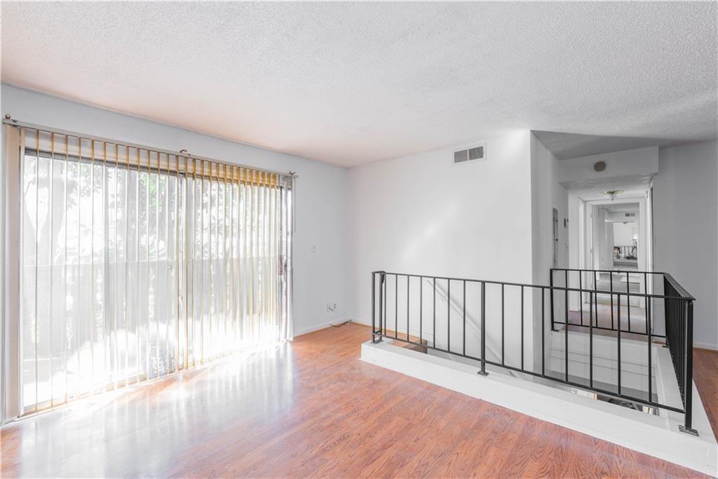 Rare opportunity to own one of the largest units in the community — over 2,000 sq ft of living space featuring 4 bedrooms, 3 full bathrooms, oversized living and dining areas, and a private balcony. Ideal for multi-generational living, first-time buyers needing space, or investors seeking strong rental potential.
All-electric systems, large closets, and low-maintenance finishes throughout. Recent updates include new HVAC (2022) and newer water heater. Conveniently located near Hartsfield-Jackson Airport, I-85, I-285, Camp Creek Marketplace, and public transit.
Seller is offering to cover up to 12 months of HOA dues with an acceptable offer — a rare incentive and immediate savings for the buyer.
Note: The community is in need of cosmetic and maintenance improvements, including grounds upkeep and road repairs. This is reflected in the price and seller incentive, offering buyers a great opportunity to build equity as the area improves.
Priced to sell. Vacant and easy to show.