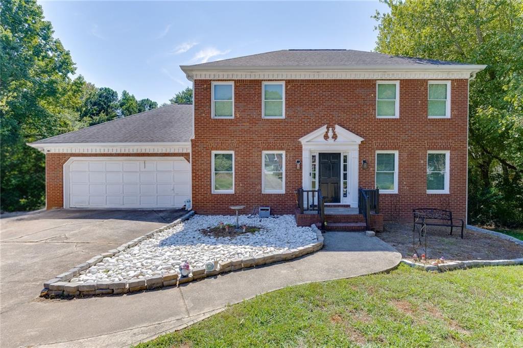 Welcome to this beautiful brick front traditional home, perfectly blending classic charm with modern updates! Located in Jefferson Station which has an OPTIONAL HOA. This home offers a huge head start towards updating with a new HVAC in 2024, 3 year old gutters and all new windows in 2023! Enjoy the warmth and character of real hardwood floors throughout the main level. The open concept kitchen has a newer dishwasher and stove. This home is equipped also with the refrigerator, washer and dryer! There’s 3 spacious bedrooms and 2 bathrooms upstairs, and let’s not forget to mention the terrace level that features a family room, bedroom and full bath! Whether you entertain on the main level, or terrace level, you’ll enjoy the spacious decks that span the back of the home and the quiet cul de sac lot. Located in the Peachtree Ridge High School cluster, easy access to I-85, Suwanee, Duluth and Lawrenceville!