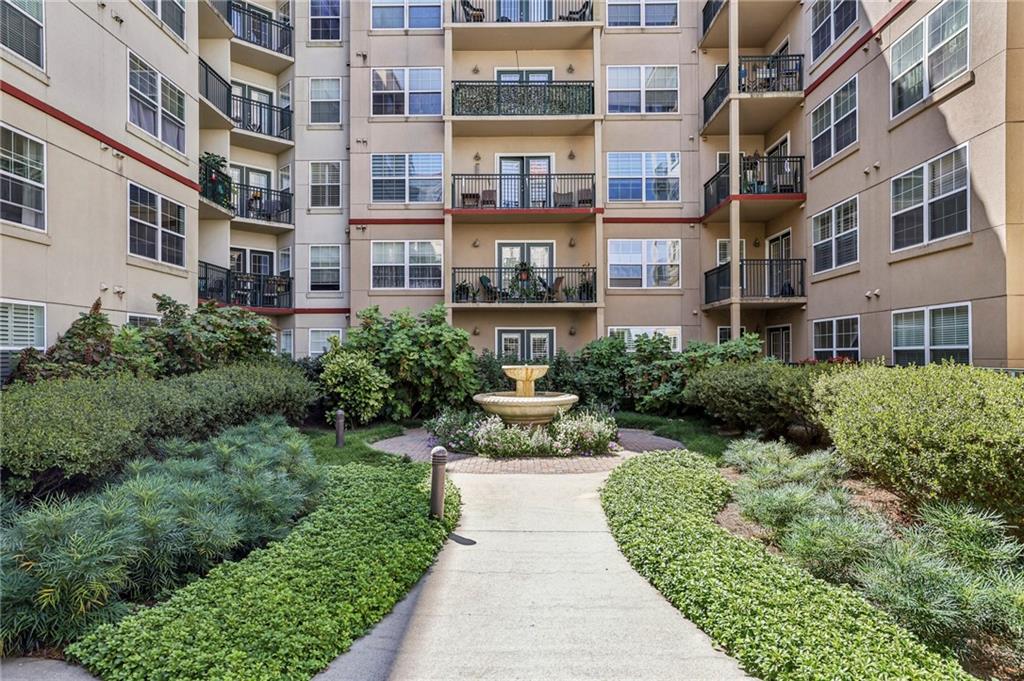 Discover the ultimate in convenience and style with this exceptional 1-bedroom condo, perfectly positioned for an effortless urban lifestyle. Step out your door and you're just a short walk from the vibrant Downtown Decatur square, where an endless selection of bars, restaurants, and shops await. Commuting is a breeze with the Marta train just a stone's throw away.
This bright and airy unit is flooded with natural light from expansive windows. The private patio overlooks the pool, creating a serene escape. Inside, you'll find a spacious primary bedroom with a large walk-in closet and a bonus flex space—ideal for a dedicated home office, a cozy reading nook, or a creative studio. Plus, the convenience of an in-unit washer and dryer means laundry day is hassle-free.
The building itself is an extension of your living space, offering incredible amenities. Unwind by the pool with a grilling area, stay active in the gym, find your zen in the yoga room, or relax with a movie in the media room. Your rent simplifies your life, including a reserved parking space in the garage, water, internet, and cable.