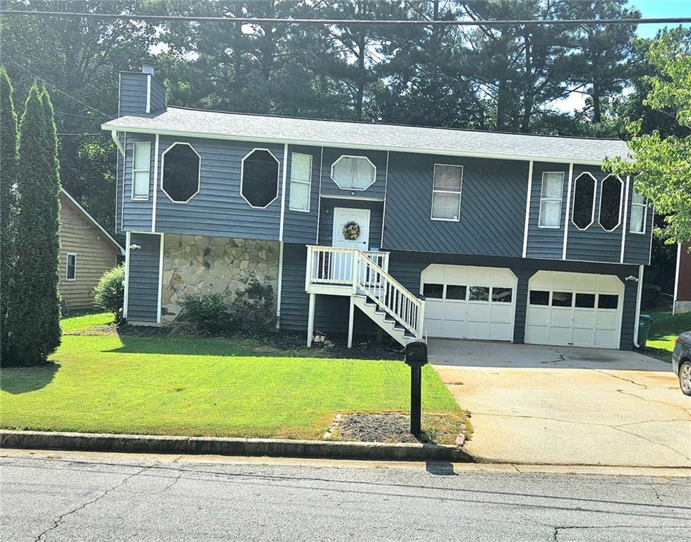 Welcome to 637 Pepperwood Lane, a beautifully refreshed home located in a quiet, established neighborhood in the heart of Stone Mountain, GA. This charming residence offers a perfect mix of modern updates and cozy comfort—ideal for families, first-time buyers, or anyone looking for a move-in-ready home.
Step inside to discover brand-new flooring throughout and fresh interior paint that creates a bright, welcoming atmosphere. The spacious living area flows seamlessly into the kitchen, that flows into the large deck making it perfect for entertaining or relaxing with family.
This home features 3 bedrooms and 2 bathrooms, a large, fenced backyard, and plenty of curb appeal. Located just minutes from shopping, dining, schools, and Stone Mountain Park, you’ll have easy access to both convenience and nature.
There is also a bonus room downstairs which can be used as an additional bedroom, playroom, office, media room the possibilities are endless with entry to the back yard. Hugh Laundry room right off the large 2 car garage.
Recent Updates: Fresh interior paint, New flooring throughout, Brand-new front porch
THIS IS A MUST SEE!