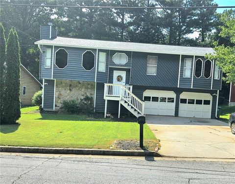 Photo of 637 Pepperwood Lane, Stone Mountain, GA 30087 (MLS # 7618101)