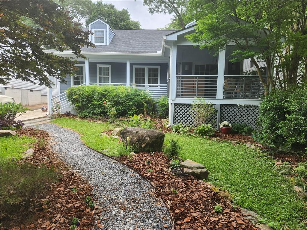 Your are going to love living at 225 Ridgeland Ave! Drive slowly, waving at the dogs and friendly neighborhoods, as you pull up to this adorable, lovely home. Notice the mostly native easy-to-ignore-and -care-for landscaping designed for busy people and pollinators. Walk down the covered front porch into a welcoming entry, where you can drop muddy boots, scarves and coats without getting the beautiful original hardwoods dirty. To your right is one of two large screen porches, where you can hang out and enjoy a morning cup of coffee outside, even if it’s raining.
To your left, the large dining room has gorgeous, custom built-ins, including a custom-made table and seating bench. It’s the perfect place for dinners, games and/or homework assignments. From here you are open to both the kitchen and the family room and can see out into the front and backyards, so enjoy all of this natural light! The family room also provides many custom built-ins and a sound insulation wall behind the TV mount. Cozy and warm, this is where you will hang to watch movies, read books and celebrate holidays.
The kitchen is a dream kitchen! Flooded with light and open to the dining room, it has more storage than you will know what to do with! The gorgeous island is the heart of the house, measuring 8 feet long it can easily sit 4 – 6 of your favorite people. From here you can watch the backyard’s activities and abundant bird life while chatting with guests in the dining room. This home has the perfect entertaining flow complete with SS appliances, miles of quartz countertops (to avoid stains), timeless white & gray cabinets and Carrara marble backsplash.
Down the hall is a private half bath, laundry and a master-on-the-main owner’s suite. This sanctuary offers 2 walls of windows, allowing for great natural light, and more beautiful, original hardwood floors. 2 closets, large double vanity, stylish tile and shower/tub combo with a nice, deep tub!
Upstairs you will find more gorgeous hardwoods and tons of natural light in the 3 secondary bedrooms; one can be used as a flex space offering more wonderful custom built-ins. This room has been everything from a movie room, teen hang out, bedroom and office. The old 1950s charm, with interesting design and dormer windows, make the upstairs special. The full upstairs bathroom has a tub/shower combo with the original cast iron tub.
When you enter the private, fully fenced backyard, you will find a spacious storage shed and the 2nd large screen porch. This porch is great for movies and entertaining! The large yard has room for roller skating, tables, chairs grills, play set, chalk art, kiddie pools, badminton, cornhole, soccer and chilling. Enjoy the gorgeous stone fireplace, where you can cook smores and enjoy cool evening. The plants include a young weeping cherry tree, blueberry bushes, camellias, rosemary, pollinator attractors, and pecan and apple trees.
This location is the best of all worlds! It is quiet but close to everything “City of Decatur,” Marta and the Stone Mountain bike path. You can be downtown in minutes in the middle of all the action or tucked quietly into your home on this tight-knit, dead-end street. Enjoy!
Owner is a licensed Real Estate Agent.