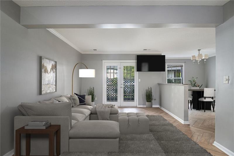 Lease Purchase Available! This beautifully renovated ground-floor end unit is flooded with natural light and offers easy access to parking. The entrance foyer leads into an eat-in kitchen that features a breakfast area, solid surface countertops, abundant workspace, and stainless steel appliances. The kitchen opens directly to the living room, creating a spacious and connected feel. A large walk-in flex room can serve as a home office or a walk-in pantry, ideal for avid cooks. Includes a full-size washer and dryer. Double French doors lead to a private patio. There is also a separate dining room. Renovated bathrooms feature modern cabinetry and lighting, with spa-like walk-in showers and ADA bars for accessibility. Gas is included in the HOA, so it's provided to the tenant at no extra cost. Electricity is the only utility the tenant has to pay. Great close-in location in the heart of Tucker, just a skip from I-285 and off Lawrenceville Highway.