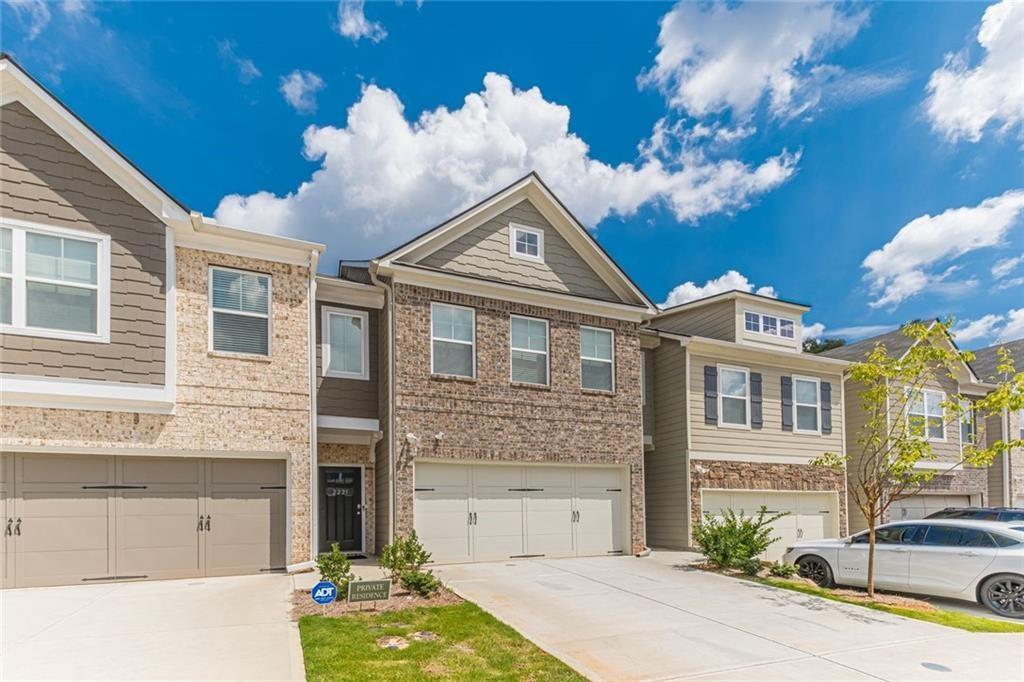 APPLICATION FEE WAIVED FOR A MOVE IN DATE BY SEPTEMBER 15TH. Welcome to this stunning, 2021-built, 3-bedroom townhome located in the Bentley Estates subdivision. This highly desirable open floor plan includes hardwood floors on the first level, vaulted ceilings, and a spa-like primary bathroom! The kitchen offers Stainless steel appliances, a spacious island, and light grey kitchen cabinets. The laundry is easily located upstairs; all appliances are less than a year old! You will find the roomy loft upstairs, perfect for entertaining. This ideal home is waiting for you! Fenced-in backyard, short commute to Atlanta, two-car garage, this home has it all! Minutes away from I-20 and I-285.