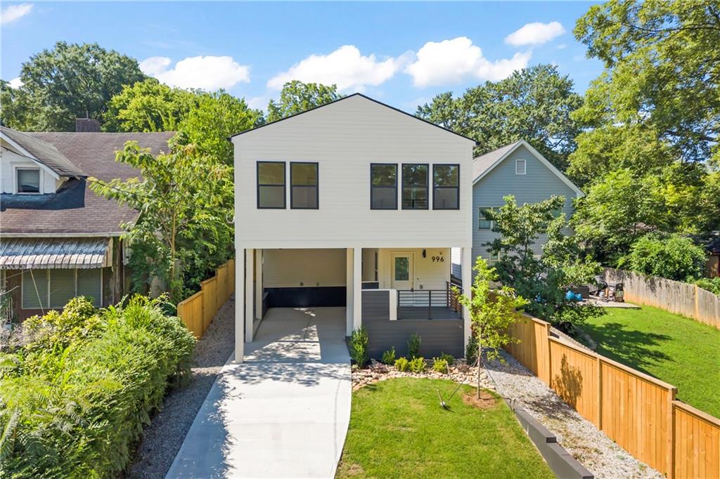 Modern Elegance Meets Smart Design in Ashview Heights. Experience the perfect blend of elevated design and functional living in this impeccably crafted residence by renowned builder Debby Le. This thoughtfully designed home features 3 bedrooms, 2.5 bathrooms, and a fully equipped Accessory Dwelling Unit (ADU) , an ideal opportunity for income potential, a home office, in-law suite or creative flex space.
From the moment you enter, you'll be captivated by the meticulous craftsmanship and modern flair. The heart of the home, the gourmet kitchen, showcases custom detailing including a handcrafted vent hood, floating shelves, and sleek white appliance package—all curated to offer a sophisticated, high-end aesthetic.
Upstairs, the luxurious Owner’s suite is a true retreat, complete with a spa-inspired bath featuring a floor-to-ceiling tiled walk-in shower, a freestanding soaking tub, anchored by frameless glass and floor to ceiling tile, and a generous walk-in closet offers ample storage.
The backyard ADU is a standout highlight—featuring a private bedroom and kitchenette, it’s a rare find that adds versatility and long-term value to the property.
Ideally located in the heart of Ashview Heights, you’ll enjoy seamless access to Atlanta’s top attractions including the Westside Beltline Trail, Mercedes-Benz Stadium, and the ongoing Gulch redevelopment. With nearby parks, boutique shops, and renowned dining options, this home offers the best of both tranquil neighborhood living and vibrant city life.
Move-in ready and unmatched in value—schedule your tour today before this modern masterpiece is gone.