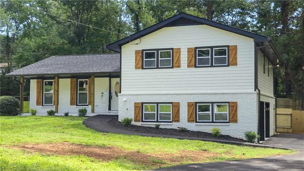 Beautifully Remodeled Home in Douglasville – Better Than New & Move-In Ready!
This stunning 4-bedroom, 3-bathroom home has been completely renovated from top to bottom with luxurious finishes and modern upgrades throughout. Enjoy true peace of mind with all-new roof, siding, gutters, windows, doors, HVAC system, plumbing, electrical, and water heater—everything is brand new!
Step inside to find new subfloors, premium LVP and carpet flooring, updated garage door openers, and a gorgeous sunroom that opens to a brand-new deck, perfect for entertaining. The kitchen and bathrooms shine with custom cabinetry, sleek countertops, new appliances, stylish light fixtures, elegant faucets, and beautifully tiled showers and tubs.
Downstairs, the finished lower level features a private room and full bathroom—ideal for rental income, an in-law suite, or a guest retreat.
Situated on a generous half-acre lot, the outdoor space offers a new driveway, shed, and fencing, with plenty of room for gatherings or future enhancements. A spacious driveway accommodates multiple vehicles with ease.
Don’t miss your opportunity to own this turnkey home in Douglasville—where everything has already been done for you!