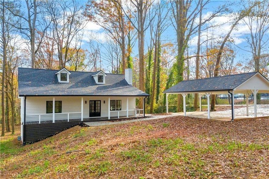 Welcome to this exquisite, fully remodeled three-story home, nestled in the highly coveted city of Milton. No detail has been overlooked in the design and finishes of this stunning property, where luxury meets functionality at every turn. Sitting on over an acre of beautifully landscaped land as you step inside, you are immediately greeted by a spacious, open-concept layout that seamlessly connects the family room and kitchen. The focal point of the family room is the striking custom-built fireplace. The kitchen has been thoughtfully remodeled with custom countertops and expansive white soft-close cabinetry, offering an abundance of storage. The entire main level of this home features two generously sized bedrooms and two full baths. The master suite offers a private retreat, complete with a custom-designed bathroom that provides a peaceful oasis while still offering ample living space. The main level flows effortlessly, showcasing brand-new flooring, a remodeled kitchen, and beautifully updated bathrooms, all enhanced by fresh paint and stylish new light fixtures. Upstairs, you'll find two additional bedrooms, separated by its own private bathroom, creating the feel of two distinct suites for ultimate privacy and convenience. This also boasts a fully finished basement with both interior and exterior entry, offering privacy and versatility. The basement features its own separate access pathway to the garage, making it ideal for in-laws, overnight guests, or even a rental opportunity. Inside, you'll find a custom-built kitchen, a spacious bedroom with a walk-in closet, a beautifully designed bathroom, and a comfortable living area. Additionally, a large storage room is tucked away at the end of the basement, complete with its own private entry. This home also has a spacious three-car covered carport, built on a brand-new, expertly poured concrete foundation to maximize driveway functionality. Everything in this home has been meticulously replaced and updated to offer a completely fresh, modern living experience. From the brand-new roof, HVAC system, electrical, and plumbing to the stunning new floors, fresh paint, and newly poured concrete—no detail has been overlooked. This is truly a "new" home, without the new construction price tag. The property is a showstopper, straight out of a home and garden magazine or an episode of HGTV, with every corner thoughtfully designed and perfectly executed. It's the ideal combination of style, functionality, and value, waiting for you to call it home.