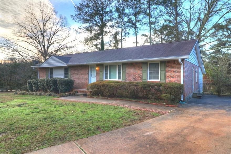 Stunning brick, ranch home with an awesome screened porch overlooking large backyard, 3 bedrooms and NEW laminate flooring. Large open kitchen-appliances are included! Move-in ready, Super Clean and Available Now!