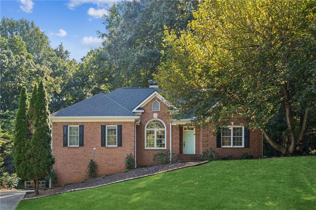 Sitting on almost a half acre of quiet privacy and located in the highly sought after West Forsyth School District, this home offers the perfect blend of being close to everything yet far enough away from neighbors that you feel like you live on a larger space out in the countryside! Swim and tennis facilities are part of the HOA and the neighborhood is perfect for walks at sunrise or sunset... or anytime you desire!
Set above the road and tucked into the trees, you’ll never have to worry about anyone looking in at you—this is an extremely private lot and location. It’s quiet. And this isn’t a cookie-cutter developers’ neighborhood; each home and property looks different, giving this neighborhood the feel of a more custom and luxurious development.
The main level balances the larger main bedroom (with full bath and two walk-in closets) on one side of the home with two other bedrooms connected by a jack-and-jill bathroom on the other side of the home. This layout offers plenty of privacy for both parents and children. The bedrooms are separated by the kitchen and eat-in bay-windowed sitting area, the living room with a fireplace and large windows, the dining room, and the foyer. The laundry room and half bath are conveniently located just off the kitchen. 9’ ceilings, vaulted ceilings, and large picture windows make this level bright and airy allowing plenty of filtered light to paint the entire living area.
Below, the terrace level, completed in 2023, has its own private entrance foyer with windows, a large TV/Rec Room, a hobby area, and a second jack-and-jill bathroom that separates two additional flex rooms with closets. The terrace level is controlled by its own HVAC zone.
Also located on this level is the two-car garage and a temperature controlled oversized workshop/storage area perfectly situated for the crafter or the serious handyman.
All that’s left is to bring your ideas for creating a backyard oasis (already fully fenced-in) and the kitchen of your dreams!
In the past two years the home has been upgraded with all new LVP floors throughout, new paint, a finished terrace level, gutter/rodent guards, new oven, dishwasher, and microwave, as well as craftsman pendant lighting on the main level.
In the past six years the home’s HVAC, roof, gutters, and garage door were all upgraded.
Don’t miss the opportunity to be so close to schools and amenities yet so far away from the hustle and bustle one commonly feels in newer neighborhoods that cram homes into smaller and smaller spaces!