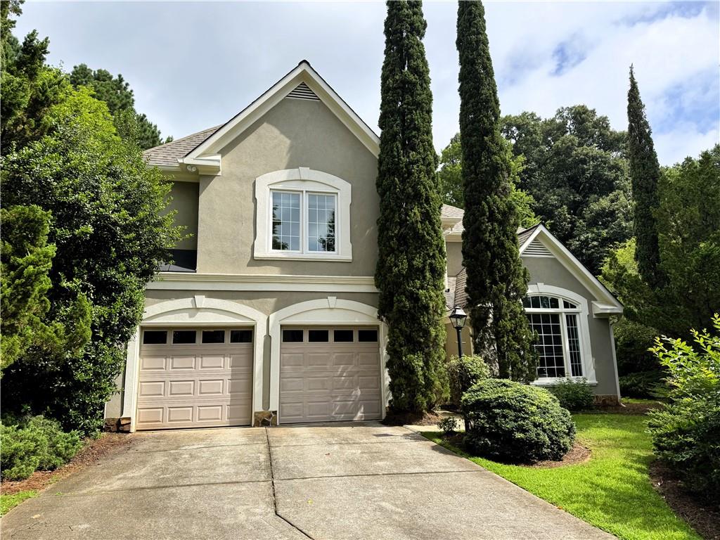 This meticulously maintained 3-bedroom, 2.5-bath home offers comfort, space, and style in an unbeatable location. The main level features gorgeous hardwood floors throughout and an open layout filled with natural light. Just off the foyer, a versatile room can serve as a formal living room, home office, or cozy sitting area. A butler’s pantry connects this room to the spacious, eat-in kitchen. Off the open kitchen is the dining room with a double-sided fireplace links to the large family room with soaring ceilings. Step off the kitchen into the screened-in porch, complete with a ceiling fan and heater, perfect for year-round enjoyment. From there, enjoy views of the beautifully landscaped, garden-like backyard. Upstairs, you’ll find a huge master suite with separate shower and tub, and walk-in closets. There are also two spacious Jack and Jill bedrooms, and wide, light-filled hallways. The conveniently located laundry room includes a washer and dryer. Additional features include whole house vacuum system, gas grill with gas line, in house speaker system and stereo, water feature in entryway, workroom off the garage. This home truly has it all—and the location can’t be beat!
