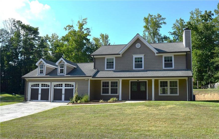 FANTASTIC HOUSE ! Move-in Ready  House, elegant entrance two wide doors without stairs! , all through  hardwood and tile floors ,  new fresh paint inside and outside the house , elegant granite in all counters kitchen, and new  garage doors and beautiful back yard . Cozy Stone fireplace in living room. Located in a Corner Lot  ,large level lot, very  established community with NO HOA , no restrictions.