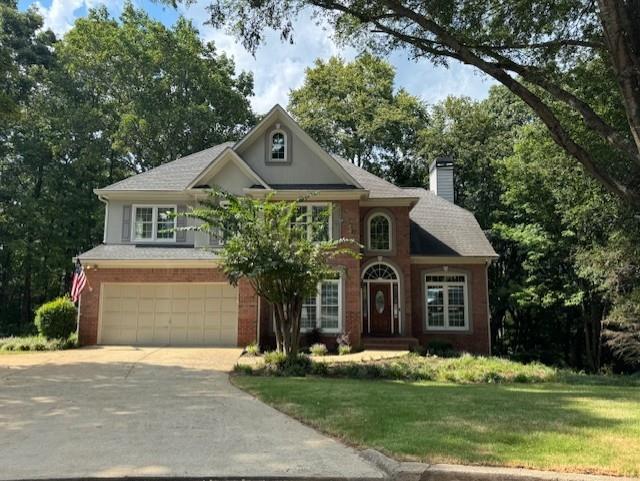 Welcome to the recently renovated home located in the highly desirable community of Chattahoochee Point. This wonderfully constructed John Wieland home features so many upgrades and presents a significant value for this community. The house sits on more than 1.25 acres and much of the land in a forever green space that provides beautiful, private wooded views from the rear of the home. This floor plan was one of the most desirable models with a full bath and large bedroom located on the main living floor. In addition, a large family room with a wall of windows built-in bookcases and cozy fireplace adjoins the gourmet kitchen. The large separate dining room with oversized windows overlooks the front yard, and an office/flex room provides the homeowner with flexibility to customize the room based on the owner's needs. The kitchen has been completely renovated with new flooring, white cabinets, all new stainless-steel appliances, and all new lighting. The kitchen has an island breakfast bar, along with an eat-in kitchen space for family dining. The family room has also been updated with new flooring, and updated bookshelves. New lighting has been added throughout all levels of the home, but with most rooms having oversized windows the natural light provides so much to the character of each room. All of the windows in the home have been upgraded to double pane easy maintenance vinyl windows, which helps with energy costs and ease of use. The oversized primary bedroom suite is located on the 2nd floor and offers privacy, a beautiful view of the wooded backyard, and a tray ceiling, large walk-in closet, and beautiful ensuite with new lighting and new tile flooring. Two additional secondary bedrooms are located across the hall, and they are separated by a full bath with double sinks and tub/shower combo. All of the air handlers, furnace and hot water heater have been recently replaced and have a transferable warranty. The large deck overlooking the wooded backyard has provides a wonderful place to BBQ and enjoy the peace and tranquility of this home. The full walk-out terrace level offers the new owners the ability to do some customization to add another bedroom, a media room, playroom, bathroom... and it already has a workbench area all set up and ready to go. With the many upgrades and improvements this home really has it all. The community offers an amazing amenities package with a large pool, multiple tennis courts, playground and soccer field, volleyball court, not to mention a fitness center and clubhouse. Shopping and restaurants directly across from community and green space with walking trails provide added convenience and enhanced livability to the community.
