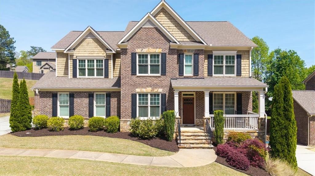 Seller is super motivated! Three sides brick, three car garage with separate bay this home offers so much! Price Correction & Seller offering $7,500 lender credit with acceptable offer via preferred lender Thomas Cady - Onward Home Mortgage Reach out for all the details!! Incredible Craftsman Home in the highly coveted Estates of Fernwood Creek! This gorgeous home boasts 6 bedrooms, 5 full baths featuring 10 ft ceilings, high-end molding & trim, hardwood floors throughout the main level, along with a bedroom and full bath on the main as well! The main level boasts fresh paint throughout! The kitchen features a gas cook-top stove, granite countertops, white cabinets, large pantry, stainless steel appliances, double ovens, wine rack and a family room with a fireplace. Lots of natural light throughout this spacious home. Special features include stone fireplace, coffered ceilings, formal dining, and home office. The primary suite is incredible, offering high ceilings, an open sitting area, spacious bathroom suite with double vanities, tiled shower, and separate tub. Large custom built out walk-in closet with private entry into the laundry room. The upstairs bedrooms are incredible with walk-in closets and so generous in size! The finished terrace level offers a finished full bathroom, bedroom, media/rec room, private poker/gaming room and studio kitchen! In addition is tons of storage space! Enjoy the custom-built screened-in porch that overlooks the private, fenced back yard complete with a fire pit! There is plenty of room for a pool too!