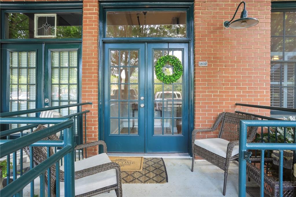 Welcome to this industrial-chic, single-level loft in the heart of Roswell, with features unlike anything you’ll find in a traditional condo. With ground-floor and corner-unit convenience, this haven blends modern finishes with historic neighborhood appeal. Step through the elegant French doors into a bright foyer with soaring 14’ ceilings, hardwood floors, and upgraded lighting that perfectly coordinates with the open-concept layout.
The thoughtfully appointed kitchen shines with crisp white cabinetry, beautiful granite countertops, a classic subway tile backsplash, and sleek stainless steel appliances. Retreat to your spacious bedroom suite featuring a roomy walk-in closet with built-in shelving and a luxurious step-in tile shower, complete with a bench and toiletry nook.
Resort-style amenities beckon within this gated community: enjoy the sparkling pool, stay active at the fitness center, or hit the tennis court. Explore the nearby Chattahoochee River National Recreation Area for hiking and paddling and the vibrant North Point Mall area for endless shopping, dining, and entertainment options.
Industrial flair meets modern comfort at 1610 Liberty Lane—a rare opportunity to enjoy single-level loft living in a historic, amenity-rich Roswell enclave. Schedule your private viewing today!
$43 application fee per person. Water included in rent. No smoking allowed. Pets allowed subject to approval and $500 non-refundable pet fee.