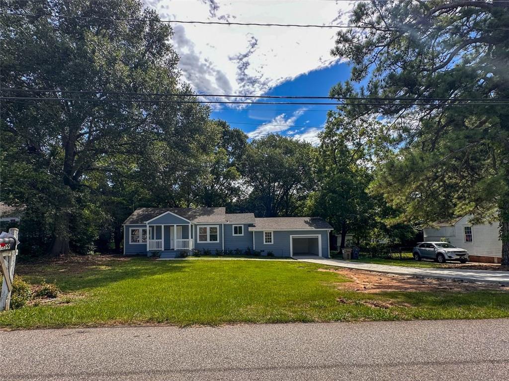 Welcome to this beautifully renovated 3-bedroom, 3-bathroom home located at 1539 Joyner Ave SE in Marietta. Situated on a 0.3-acre lot, this move-in-ready property features two primary-style suites, each with a private full bathroom, plus a third guest bedroom and an additional full bath.
Enjoy a modern kitchen with brand-new granite countertops, stainless steel appliances, and updated lighting fixtures. The entire home has been upgraded with new flooring, new plumbing, new water heater, and updated electrical throughout.
The property includes a converted small detached storage that can be used as a single-car garage perfect to fit small cars (Ex: Civic, small sedan size) with a new power-operated garage door and a back entrance leading to the laundry/mudroom. A brand-new concrete driveway and front walkway provide excellent curb appeal.
Conveniently located near major educational institutions and local amenities:
0.2 miles to Pearson Middle School
0.9 miles to Green Acres Elementary
1.0 mile to Fair Oaks Elementary
2.0 miles to Osborne High School
7-minute drive to Chattahoochee Technical College
15-minute drive to Kennesaw State University (Marietta campus)
Close to I-75, local parks, shopping, and dining
All major systems and surfaces have been updated, making this home an excellent opportunity for buyers seeking a turnkey property in a well-connected Marietta location.