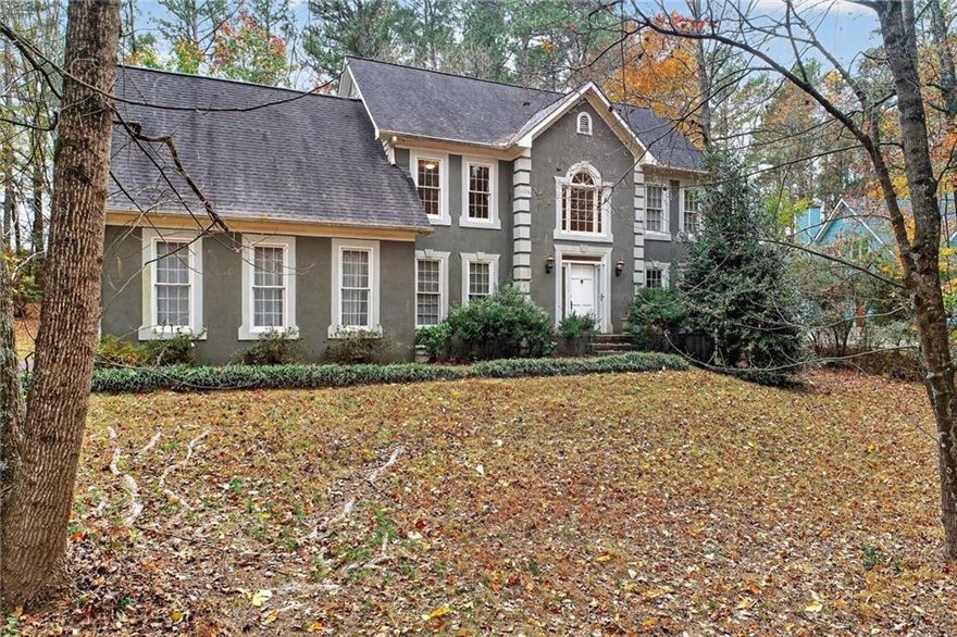 ALPHARETTA HOME W/ CHEROKEE COUNTY TAXES! Large home in Hopewell Chase community.  Over an acre lot, beautiful stately home with private back yard.  Interior of home has hardly been lived in.  Great opportunity to move in and update as you go!  Once in good condition home is worth much much more! Fabulous front and rear stair cases, 2 story great room, eat-in kitchen overlooking the private backyard, and an additional dining room, sitting room and office located off the 2 story entrance. Upstairs has 3 large bedrooms and a beautiful master bedroom with trey ceiling.  Master en-suite has dual vanities, garden tub, separate shower and large walk-in closet. This is one of the largest homes in the community!  Floor plans are in with the photos.  TOUR TODAY!