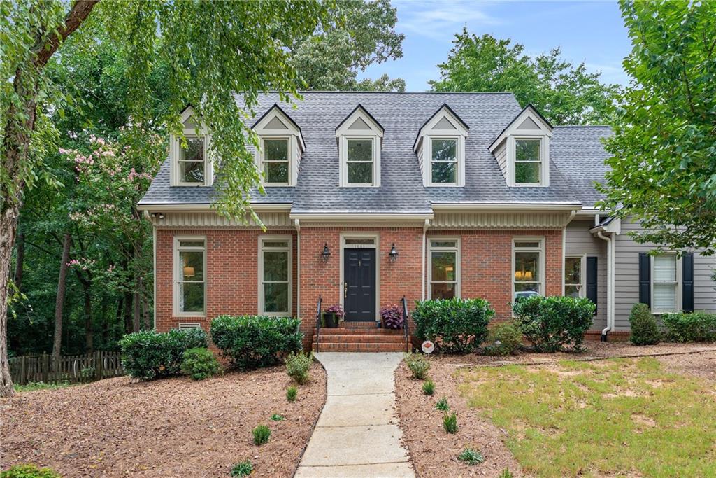 Welcome to 1061 Polo Club Drive—where space, function, and location come together in the heart of Saddlebrook, one of West Cobb’s most desirable swim/tennis communities. Set on a large corner lot with a fully fenced backyard, this spacious and beautifully updated
property offers a serene setting for you to call home! The main level offers a fluid floor plan that allows flexibility to utilize the rooms in a
variety of ways that suits your needs. A beautifully updated eat-in kitchen is light and bright, flows to the eating area and family room
providing amazing views to the gorgeous backyard. With brand new carpet in the family room and living room, you truly won't need to
change a thing in this well maintained home. A screened-in porch and connected deck overlook the backyard creating an ideal setting for
relaxed outdoor living year-round. The upper level has brand new carpet throughout and a spacious primary bedroom with a renovated
bathroom featuring double vanities and a large soaking tub that creates a relaxing spa like setting. Additional bedrooms on the upper level
are well proportioned including an oversized ensuite guest room with an attached bathroom. The finished basement adds even more
versatility with an additional bedroom, full bath, and open living space ready to be crafted into a family room, office or gym. Additional
storage space in the basement provides you with ample space to grow into. This home offers the perfect blend of privacy, community, and
convenience. Don't miss your chance to make it yours!