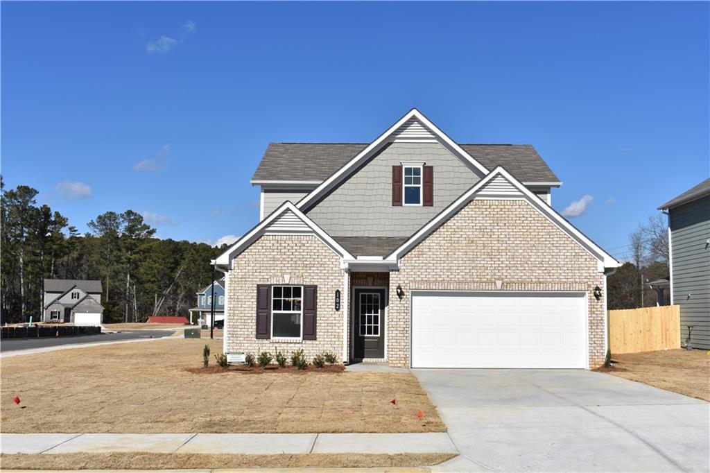 Welcome home to the sought after Caldwell floor plan in the Aubrey Park subdivision boasting 4 bedrooms and 2.5 bathrooms on a fantastic corner lot. The open main level has a formal dining room, in the kitchen with massive granite counters and a bar that opens to the oversized fireside family room that walks out to the covered patio. Owners' suite on main level with large walk in closet and private oversized tiled walk-in shower. The upstairs has 3 additional all oversized bedrooms and a double vanity bathroom. The upstairs has a sitting area or bonus room that could be used as an open office or media room. This home boasts lots of storage space and is a must see. New whole home window blinds, garage door opener installed.