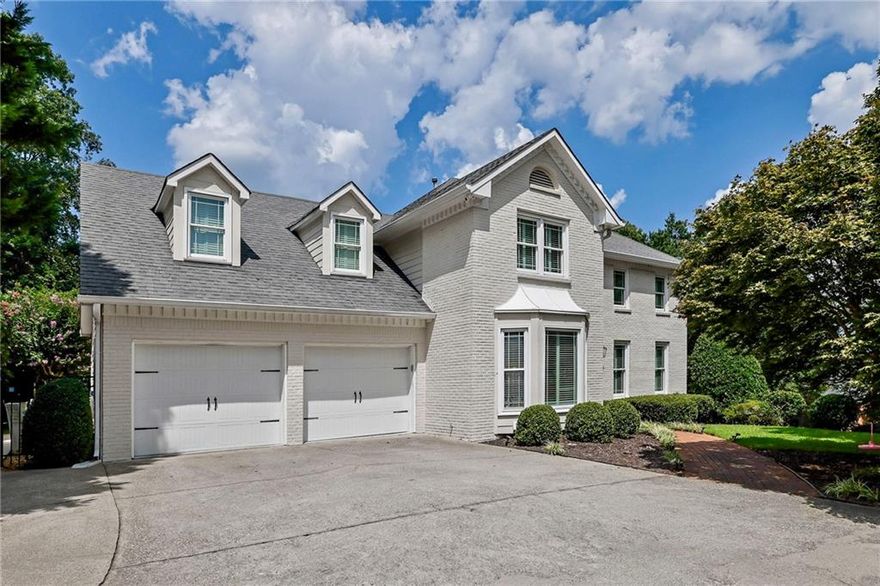 Welcome home to this beautifully appointed residence with its backyard oasis in the heart of Windward, just minutes from Avalon and Downtown Alpharetta. The centerpiece of the home is a stunning modern kitchen with soft-close cabinetry, quartz countertops, two dishwashers, an induction cooktop, and plumbing for a steam oven, all opening to bright living spaces and a four-season sunroom that overlooks the heated saltwater Pebble Tec pool and spa. Step outside to discover a true retreat with a fully upgraded outdoor kitchen and barbecue area, a Trex deck with dry underdeck system, and a tranquil pond with waterfall, all secured by a five-foot Viking fence for privacy. Inside, Brazilian cherry hardwood floors run throughout, complemented by a motorized foyer chandelier, freshly painted interiors, new hardwood floors upstairs, and a dramatic floating staircase with dual staircases that add both convenience and style. The primary suite is a luxurious escape with Turkish marble, a zero-entry double shower, and floating vanities, while every bathroom in the home has been remodeled with sleek, contemporary finishes. Recent updates provide peace of mind, including new Simonton energy-efficient windows, two Lennox HVAC systems with Ecobee wi-fi thermostats (2022), a new water heater (2022), and new Wayne Dalton garage doors. Thoughtfully designed for both entertaining and everyday living, this home offers the perfect balance of comfort, style, and resort-like amenities in one of North Atlanta’s most desirable communities.