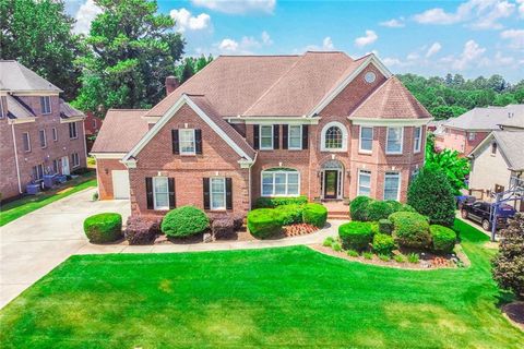 Photo of 1136 Hiddenbrook Lane, Suwanee, GA 30024 (MLS # 7613474)