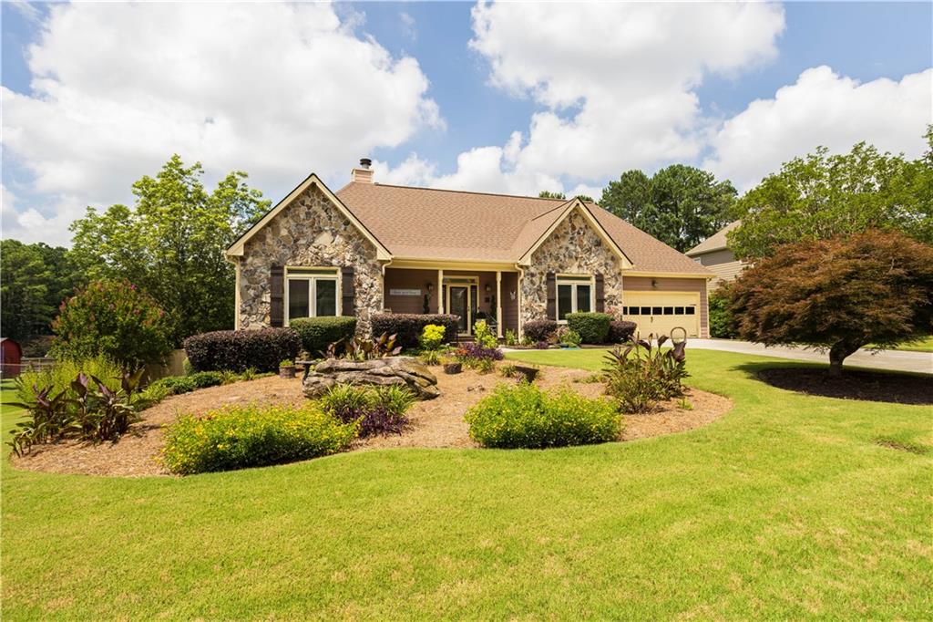 No HOA! No HOA! In Prime Loganville Location! HOME WARRANTY!! Well, maintain 4BD/3.5BA home. This is a distinguished ranch home with timeless appeal. This ranch sits on a finish basement; it also has an oversize bonus room with a full bathroom. Master Suite on main w/ large spa bath. New roof, New Windows, New water heater, New Furnace~ Corian countertops in kitchen ~ Appliances two years old ~ Beautiful Land Scaped yard~ Incredible backyard with large, covered deck and hot tub! Must see!!! Appointment Only!! Listing agent is a co-owner of this property.
Seller willing to contribute $1,500 towards carpet allowance with an accepted offer.