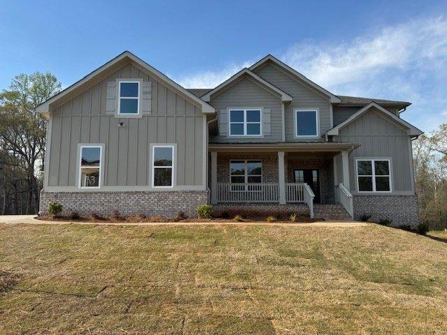 : Welcome to The Brookdale, a luxurious new construction home featuring 5 bedrooms, 5.5 baths, a three-car garage, and a full unfinished
basement. The perfect blend of sophistication and all the modern amenities is offered in this beautiful residence! Upon entry into the grand foyer, you will be
greeted by a warm living room and a formal dining room on this level. A fantastic 2-story family room with a coffered ceiling is off the kitchen, and a separate
breakfast area with a door leads out to a lovely covered deck. Prepare delicious meals in the chef's dream kitchen with granite countertops, a modern tile
backsplash, a huge island, a walk-in pantry, stainless steel appliances, and beautiful hardwood floors. The main level also features a bedroom with a private
bathroom. The beautiful oak wood staircase, featuring wood handrails and wrought iron spindles, leads to the primary bedroom suite, which has a large luxury
bathroom and a large walk-in closet. The second floor has an additional three bedrooms with private bathrooms.
