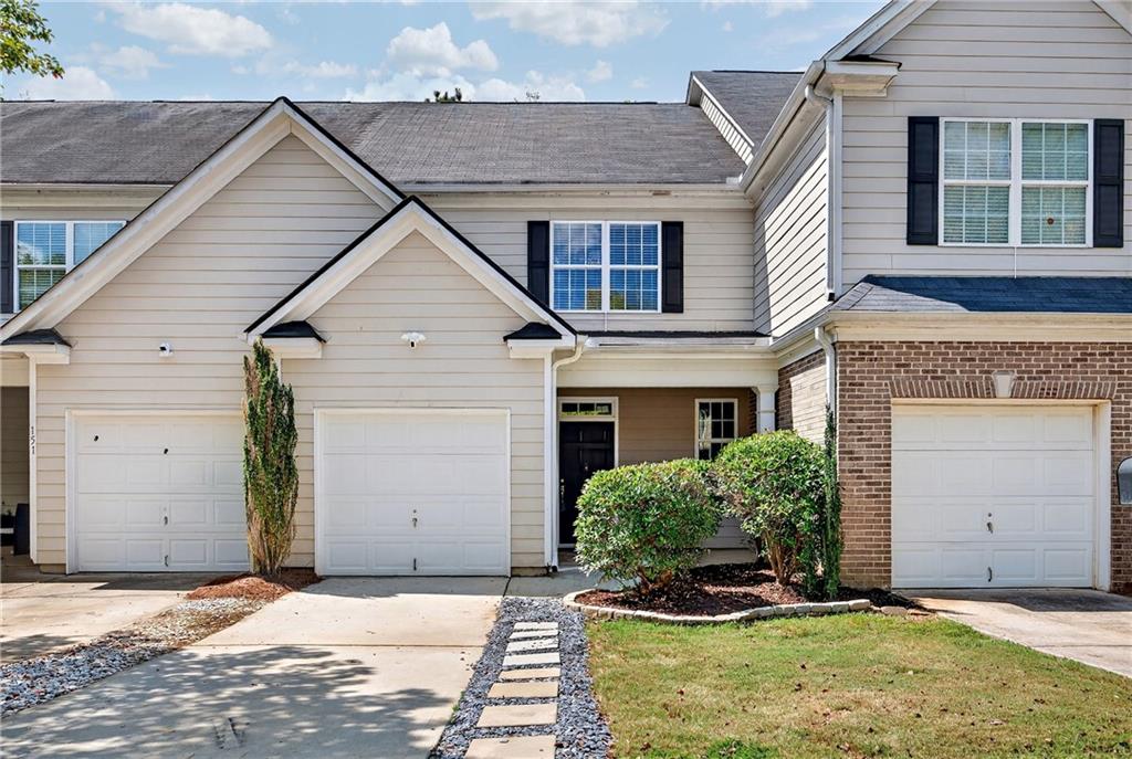 Move-In Ready Townhome in Stonebridge – Newnan, GA. Beautifully maintained 3-bedroom, 2.5-bath townhome located in the desirable Stonebridge community of Newnan. Built in 2009 and thoughtfully updated, this home is perfectly move-in ready with modern comfort and peace of mind. Recent upgrades include a brand-new roof (2025), new HVAC system (2025), and new carpet throughout. The inviting open-concept floor plan features a spacious family room that flows seamlessly into the dining area and kitchen. The kitchen is designed with solid surface counters, ample cabinet space, and a view to the family room, making it an ideal hub for entertaining or casual meals. Upstairs, the oversized primary suite offers a relaxing retreat with a large walk-in closet and private bath. Two additional bedrooms and another full bath provide flexibility for family, guests, or a home office. Enjoy the community amenities, including a clubhouse, pool, playground, tennis courts, and sidewalks for leisurely strolls. Stonebridge is also just minutes from Ashley Park shopping and dining, Piedmont Newnan Hospital, and Historic Downtown Newnan. Convenient access to I-85 makes commuting to Atlanta or Hartsfield-Jackson Airport a breeze. This townhome combines modern upgrades, community living, and unbeatable location — all at a great value. Don’t miss your chance to make 153 Granite Way your new home! Schedule your showing today.