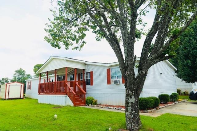Take a look at this spacious 4 bedroom 2 bathroom oversized double wide home! Located in Hampton, GA just minutes away from schools, shopping, dining, and a short drive to the airport! This home features 2 living rooms, a fireplace, soak tub in the master bedroom, and a separate formal dining room! Cozy covered front porch perfect for morning and evening relaxing! This home is filled with potential to make it your own!