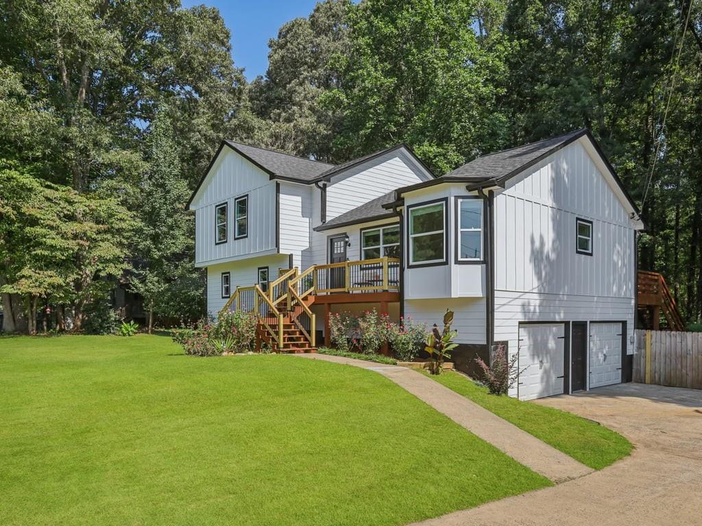 Tucked away at the end of a quiet cul-de-sac in the desirable Westland Mill community, 6502 Will Dupree Lane presents a rare opportunity to secure a beautifully updated split-level home set on nearly 0.7 acres of serene Georgia landscape. Framed by mature trees and featuring a level, oversized lot, this property offers a welcoming first impression with its fresh new board and batten siding, bold curb appeal, and freshly painted exterior.
Step inside to a meticulously upgraded interior that reflects both craftsmanship and care. Virtually every surface has been enhanced during the homeowner's stay, including a new roof, new HVAC, and new garage doors with motors, offering peace of mind and modern efficiency. Gorgeous new flooring runs throughout the home, connecting bright and airy living spaces, while freshly painted walls and updated railings lend a crisp, contemporary vibe. The living room centers around a cozy fireplace and flows seamlessly into a fully renovated kitchen featuring new cabinetry, new stainless steel appliances, and sleek hard surface countertops.
The upper level hosts three spacious bedrooms, including a primary suite with a renovated en-suite bath showcasing stylish fixtures and finishes. The additional full bathroom has also been tastefully redone, ensuring comfort and elegance throughout. Downstairs, a finished lower level adds functional flexibility with a fourth bedroom or office, a powder room, and access to a newly drywalled garage.
Step outside to the inviting back deck, ideal for grilling, relaxing, or entertaining, overlooking a private, wooded yard that offers both space and tranquility. The exterior upgrades continue here, with new front deck railings and thoughtful landscaping setting the stage for peaceful evenings or weekend gatherings.
The lifestyle this home offers extends beyond its walls. Located minutes from Lake Allatoona, Lake Acworth, and Cobblestone Golf Course, outdoor enthusiasts will relish the abundant options for boating, fishing, hiking, and golfing. Commuters will appreciate the easy access to I-75, while locals enjoy the small-town charm and vibrant community events in historic Downtown Acworth & Downtown Woodstock, just a short drive away. Whether it's dining at Henry's Louisiana Grill, strolling the trails at Red Top Mountain State Park, hiking your own private backyard trail to the lake, or exploring the boutiques and museums around town, life here blends comfort, convenience, and natural beauty.
With its impressive list of upgrades and unbeatable location in one of Cherokee County’s most cherished communities, this home is a true standout. Don’t miss your chance to experience refined suburban living in Acworth, schedule your private tour today.
