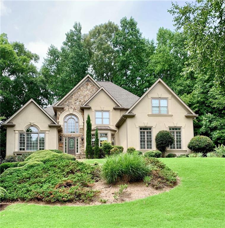 Dear ?Buyer,
I would like to welcome you to River Laurel, a highly desirable gated community in Suwanee. This spacious traditional
residence boasts a versatile floor plan with six bedrooms, five bathrooms, and a finished basement featuring various
bonus rooms, perfectly suited for recreation, fitness, or a home office.
The main level presents an inviting open living area with hardwood flooring and a generously sized, updated kitchen,
complete with a walk-in pantry. This space seamlessly overlooks a comfortable family room with a fireplace. The
upper level includes well-proportioned bedrooms and an expansive loft. Additionally, the outdoor deck provides a
serene view of a private, landscaped backyard, ideal for relaxation or hosting guests.
River Laurel offers a secure environment with a vigilant security guard and provides residents with access to swim,
tennis, and playground facilities. Situated within the esteemed North Gwinnett school district, the community offers
convenient access to shopping, dining, and major commuter routes.