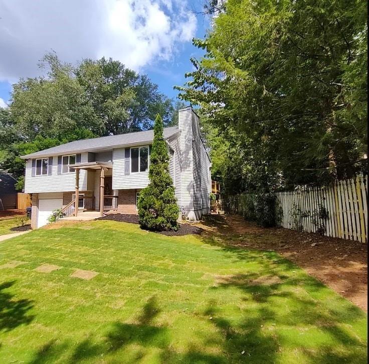 Location, Location Location, close to 400 and Holcomb Bridge rd. Discover your dream home in the charming well established community of Roswell! Nestled on a quiet cul-de-sac, this recently fully remodeled split-level residence boasts 4 bedrooms and 3 bathrooms, including an expansive in-law suite complete with a cozy fireplace, a home office for your convenience, and a dedicated laundry room.
The upper level welcomes you with a spacious living room and a delightful dine-in kitchen equipped with sleek stainless steel appliances.
From here, step out onto the freshly constructed deck, a serene oasis perfect for unwinding or hosting gatherings with friends and family. Positioned on the largest lot within the cul-de-sac, this property spans a generous 1/3 acre and offers a fenced backyard, providing ample space for little ones to play.
Additional features include new ceiling fans and fixtures, smoke detectors in every room for added safety, and elegant flooring with luxury vinyl plank upstairs and stylish tiles downstairs. The roof is adorned with architectural shingles, enhancing both durability and aesthetics. Security measures are in place with outdoor surveillance cameras and a secure vault for your peace of mind. Enjoy the utmost convenience with easy access to highways and nearby amenities, making this home a perfect choice for those seeking a harmonious blend of comfort and practicality. Nearby are many notable schools including private and public chartered school.