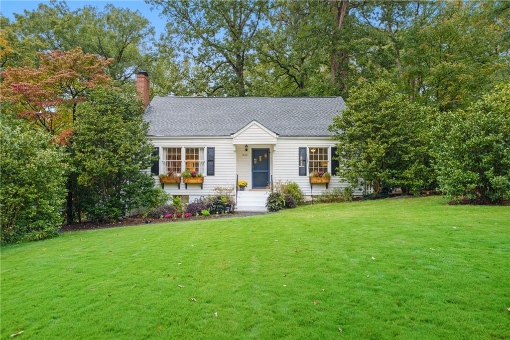 Great Location and Amazing Lot! Come experience this natural oasis in Pine Hills, one of Atlanta’s most desirable neighborhoods. Nestled on a peaceful 0.5-acre corner lot framed by majestic oak trees, this property offers rare privacy and tranquility—all less than a mile from the heart of Buckhead with easy access to I-85 and GA-400. This updated home features an open, light-filled floor plan with hardwood floors throughout, inviting living spaces, and a renovated kitchen perfect for entertaining. The large, flat lot provides incredible potential for a future addition or custom expansion while maintaining beautiful, mature landscaping with native, low-maintenance plantings, a fenced backyard, and a pristine front lawn.
Pine Hills was named one of Atlanta Magazine’s Top Neighborhoods and is known for its quiet, walkable streets, with a rare in-town Swim & Tennis Club, and Shady Valley Park. The home’s unbeatable location puts you less than a mile from Lenox Square, Lenox MARTA station, and Children’s Healthcare of Atlanta’s new Arthur M. Blank Hospital, and just 1.5 miles from Phipps Plaza.
Recent updates include a new roof, upstairs bathroom renovation, new HVAC upstairs and main level, full septic system replacement, front yard irrigation, insulation and duct sealing. 
A rare blend of location, land, and lifestyle—this beautiful home  delivers timeless charm, modern comfort, and endless possibilities.